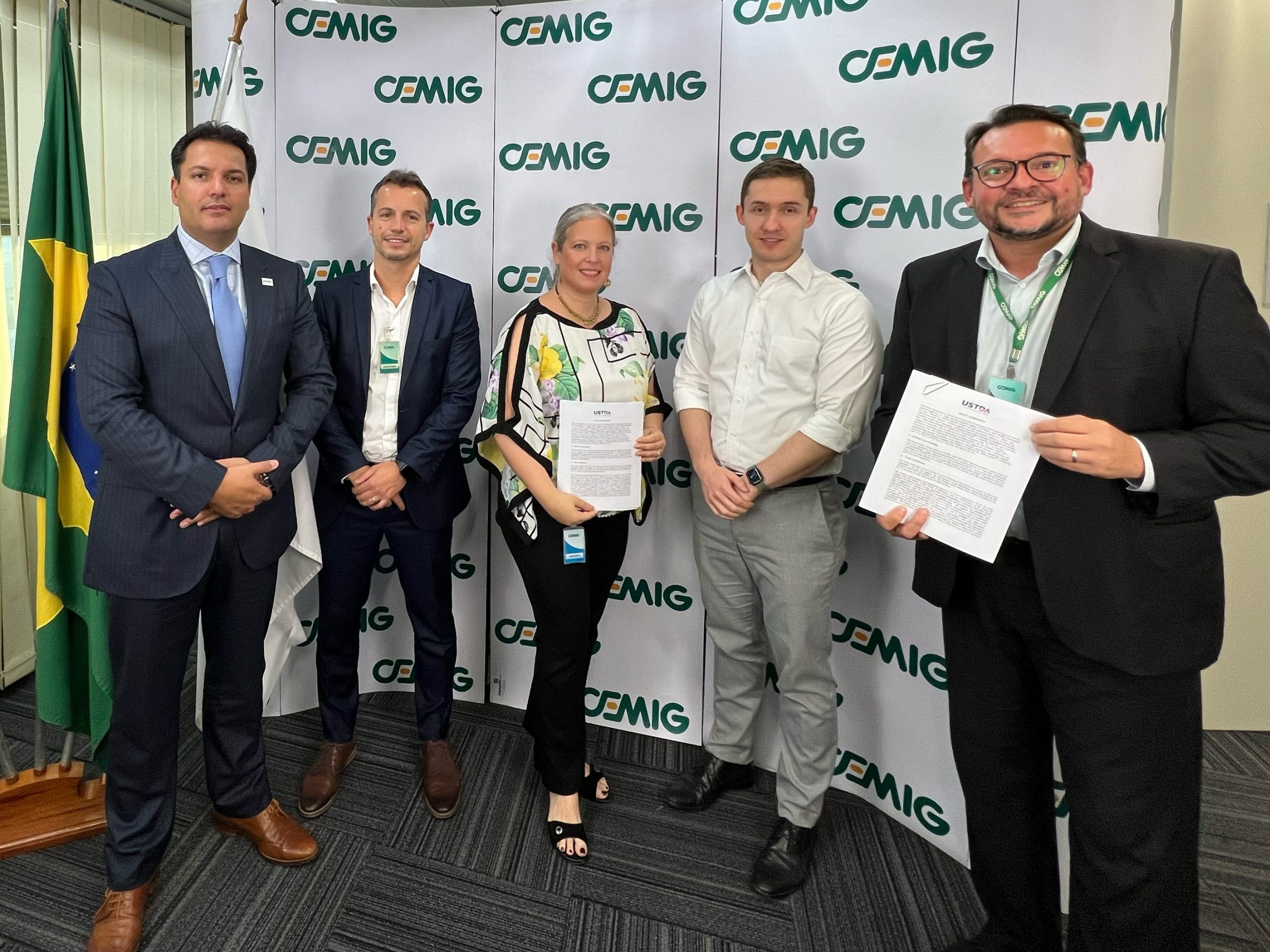 Group photo with signed documents
