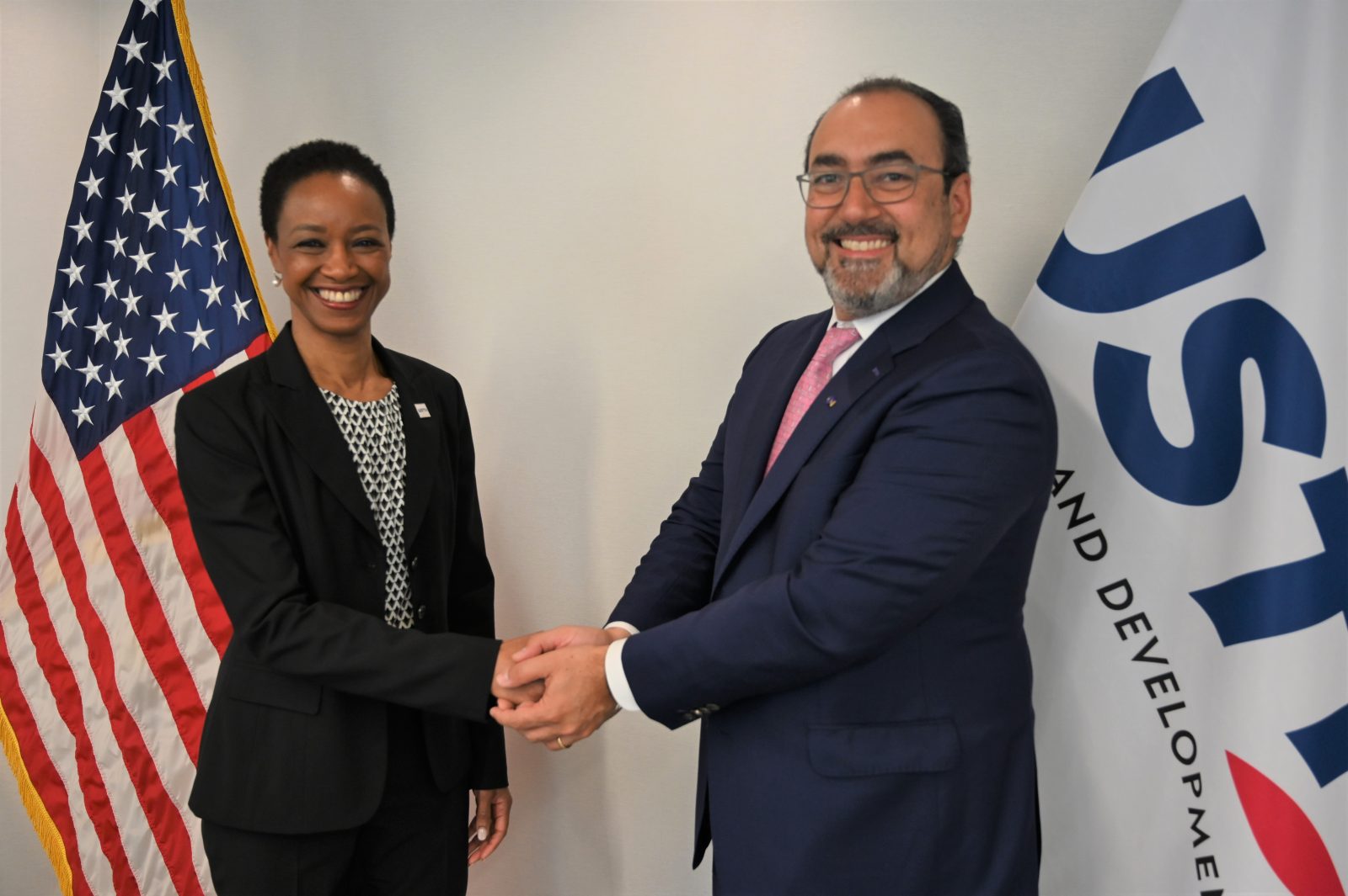 Photo of USTDA Director Enoh T. Ebong with CAF Executive President Sergio Díaz-Granados