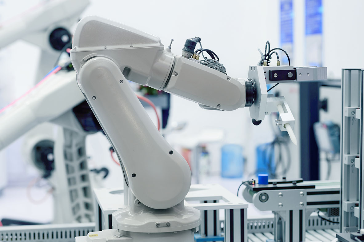 An image of a robotic arm in a lab or factory