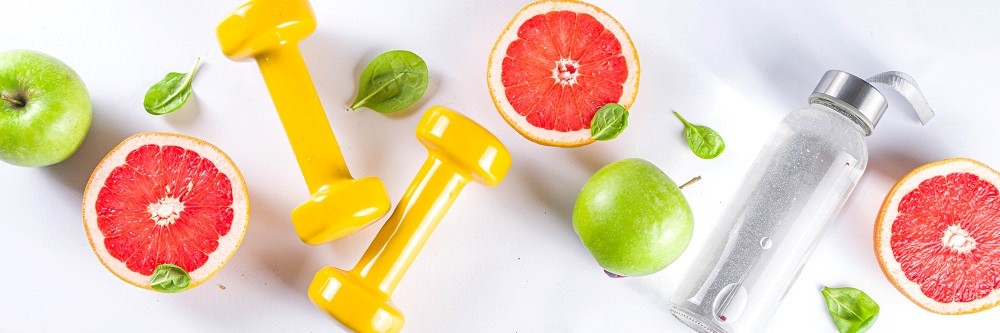 Image with weights, fruit and water