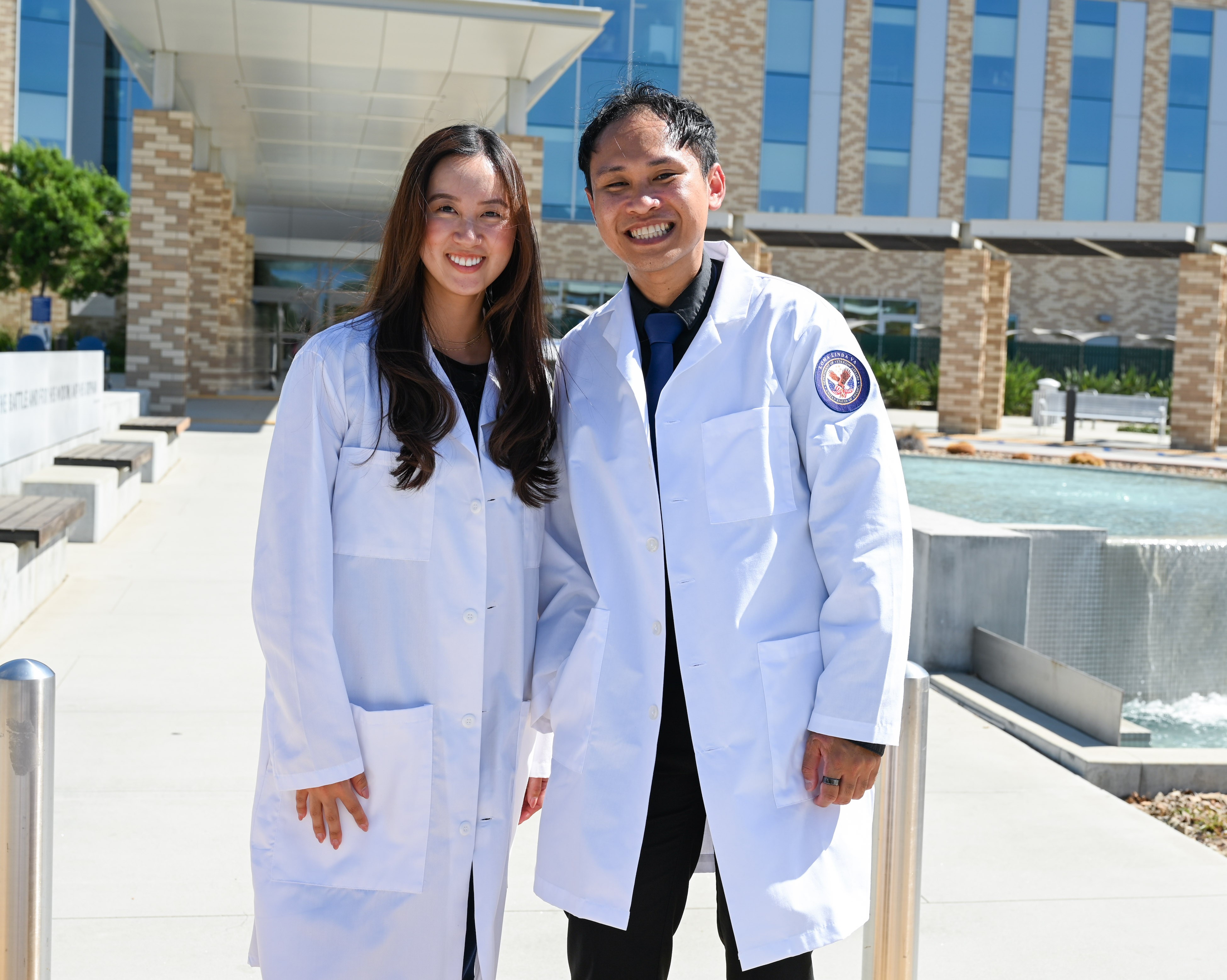 Two Pharmacy Residents stand out front of the Ambulatory Care Center