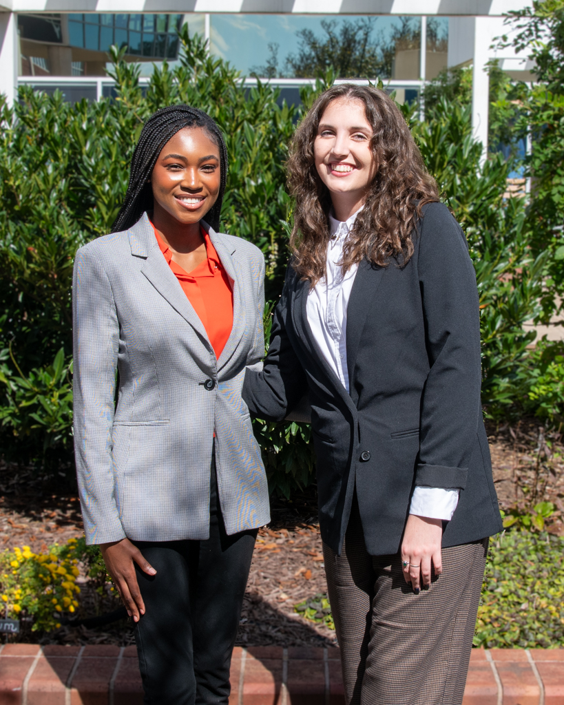 Two women standing together