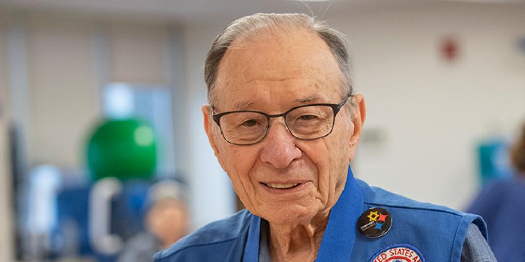 Veteran posing with his medallion