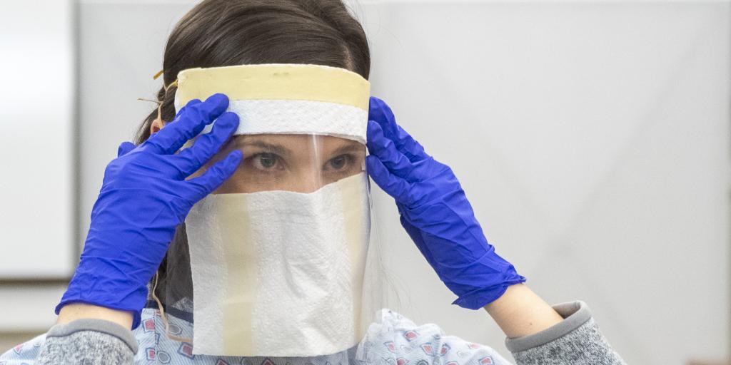 Nurse with face mask.