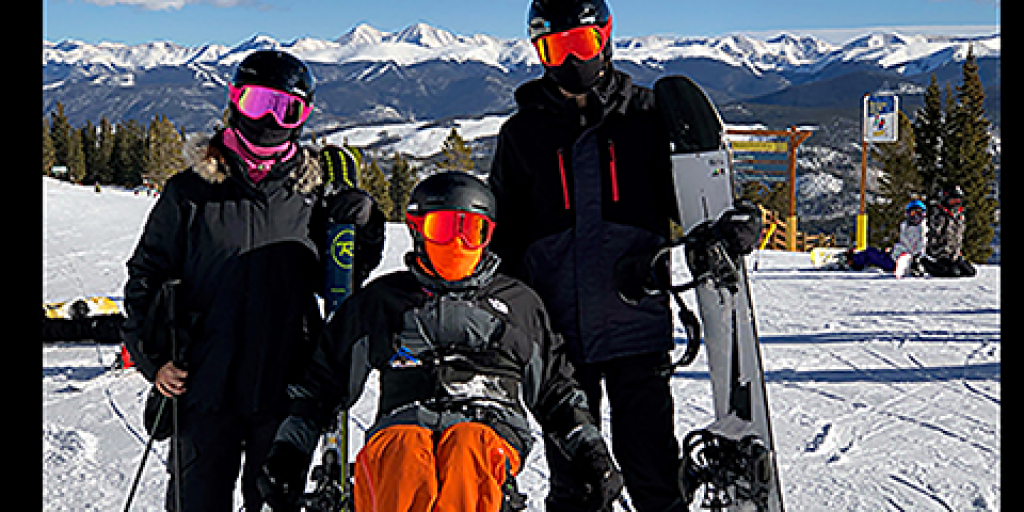 Army Veteran Nathan Turner skiing in Breckenridge, CO with his wife and son. Turner learned to ski during the pandemic.