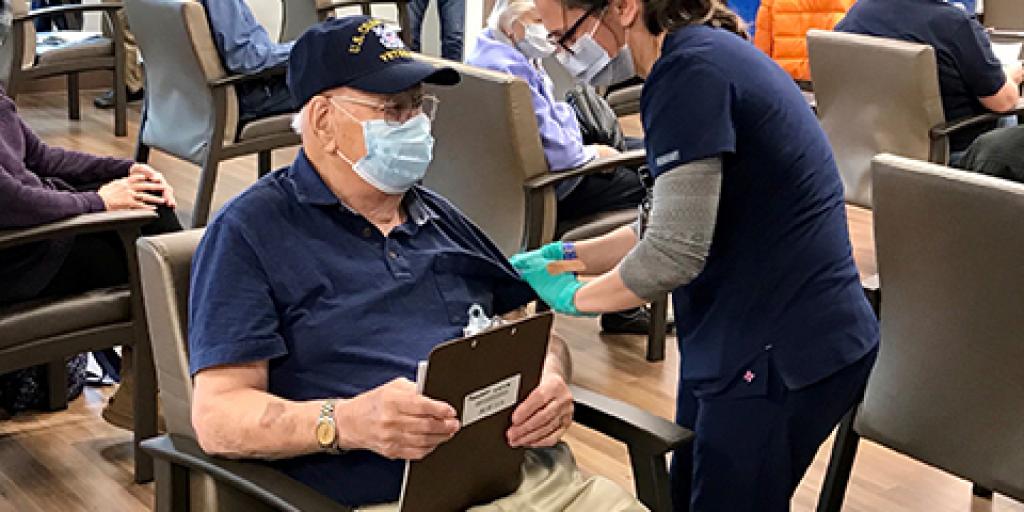 98-year-old WWII Veteran John Dempsey receives with COVID-19 vaccination at the North Charleston VA Outpatient Clinic on Feb. 1, 2021. 