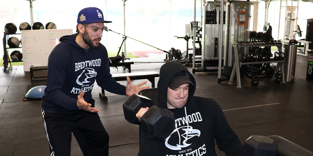 Marine Corps Veterans Raymond Navarro (left) and Greg Becker (right) are fitness facilitators and coaches at the Veterans Center for Recreation and Education (VCRE) where they help their fellow Veterans enhance their physical and mental health through exercise. 