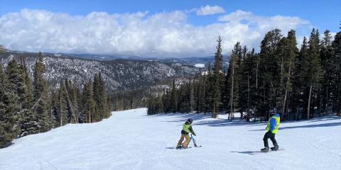 A Veteran on a ski-bike on a mountain