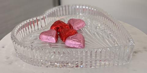 Chocolate hearts in a heart-shaped dish