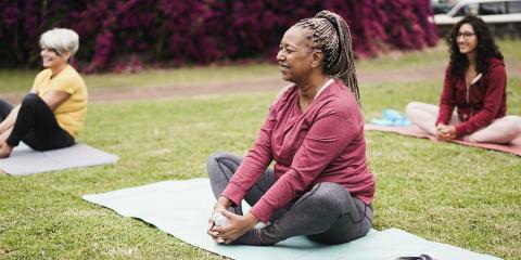 black woman doing yoga