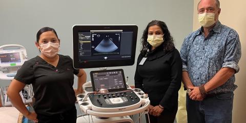 VA staff with an echocardiogram ultrasound machine