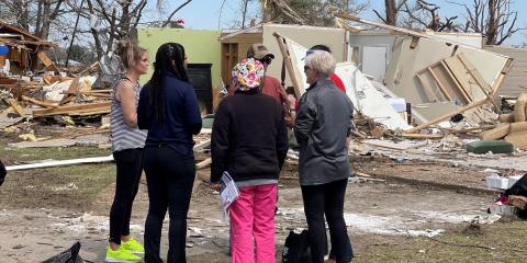 Jackson VA staff visiting with Veterans and their families impacted by the devastating EF-4 tornado in Rolling Fork, MS.jpg