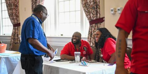 SC Thrive employees enjoy a quick laugh at the Columbia VAHCS Landlord Fair, April 230.