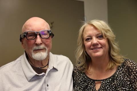 Korean War Navy Veteran Walter Crites with his Northern Arizona VA audiologist Dr. Darla Gilder while wearing his new caption glasses.