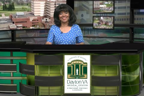 Rhonda Moore, Public Affairs Officer, at desk